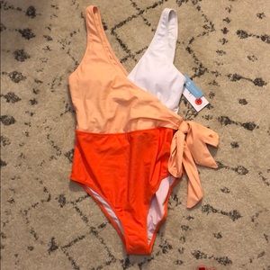 Color block one piece, NWT, size medium